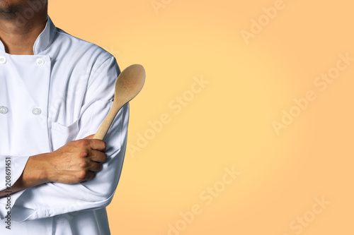 Chef with a spoon background with space for text