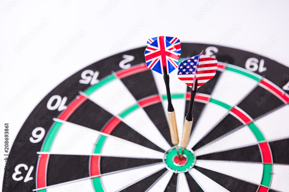 Darts in aim. Flags of the USA and the United Kingdom on darts. Darts in aim. Flags of the USA and the United Kingdom on darts.