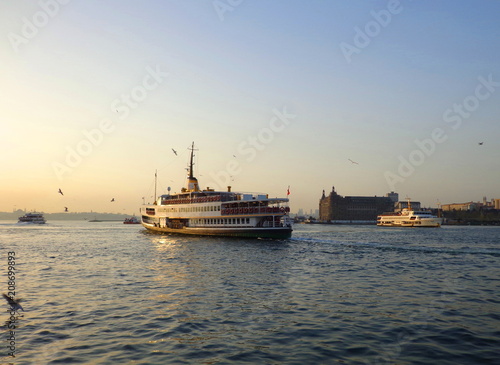 Passenger ferry arriving at Kadikoy port in ıstanbul , Bosphorus  view at
