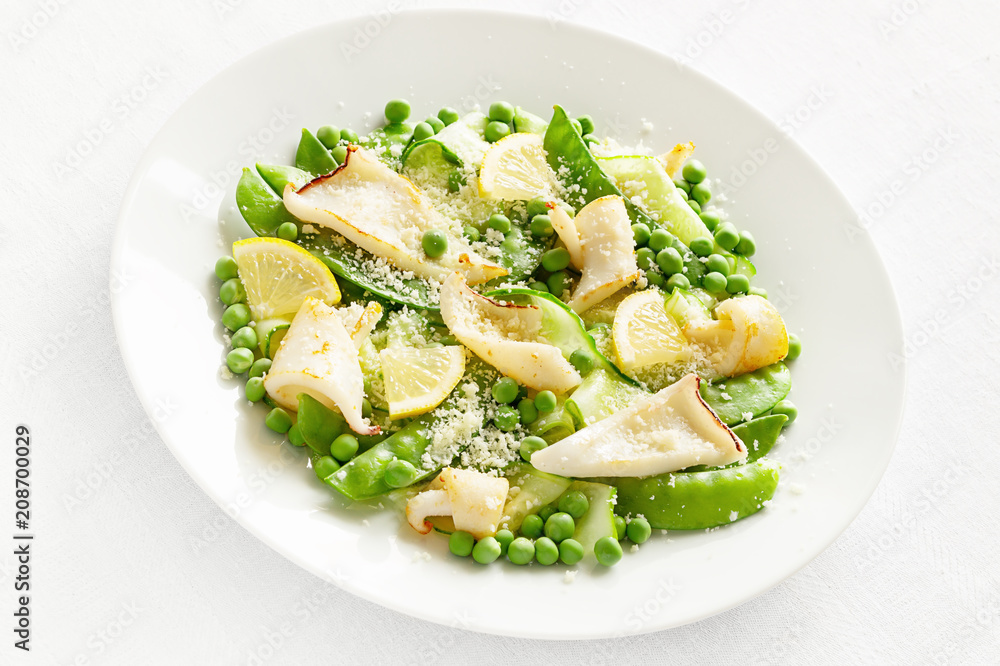 calamari pea salad with cucumber, lemon and grated cheese dressed with oil and vinegar calamari pea salad with cucumber, lemon and grated cheese dressed with oil and vinegar