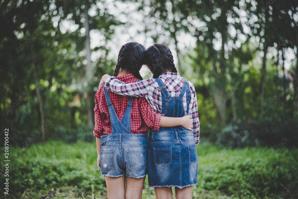 Two girls hand holding together Two girls hand holding together