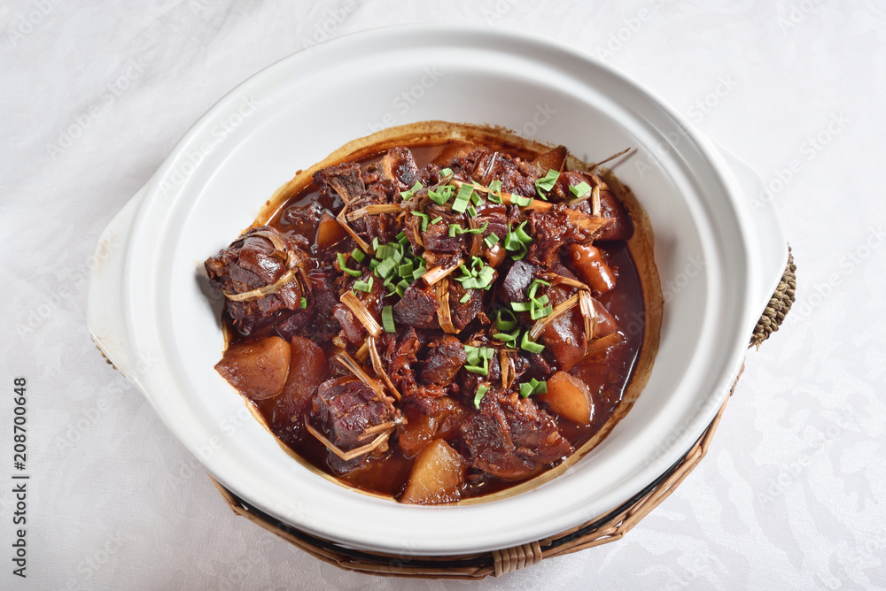 Braised lamb with soy sauce in clay pot Braised lamb with soy sauce in clay pot