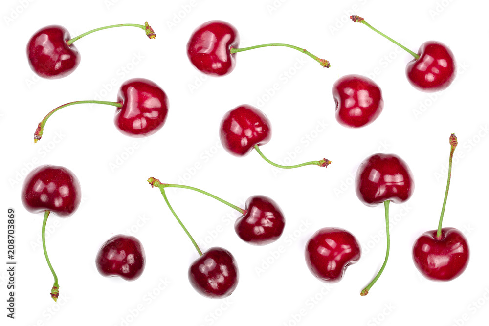 Sweet red cherries isolated on white background. Top view. Flat lay pattern Sweet red cherries isolated on white background. Top view. Flat lay pattern