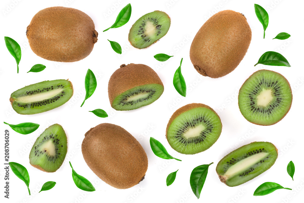 Kiwi fruit with slices decorated with green leaves isolated on white background, close-up. Top view. Flat lay pattern Kiwi fruit with slices decorated with green leaves isolated on white background, close-up. Top view. Flat lay pattern