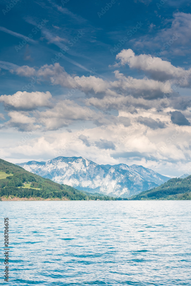 Beautiful cloudscape over mountains and lake at Wolfgangsee,Austria