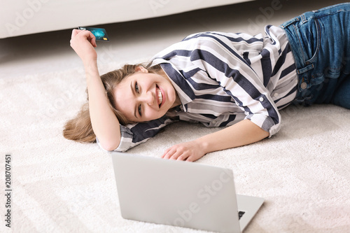 Young woman shopping online...