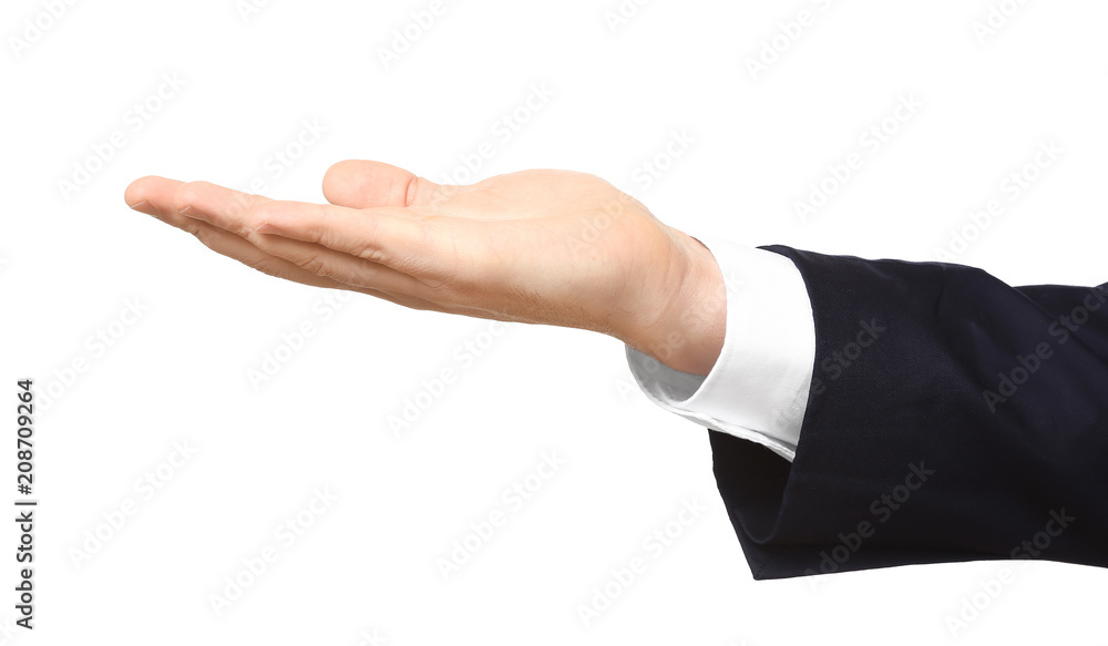 Young businessman holding something on white background