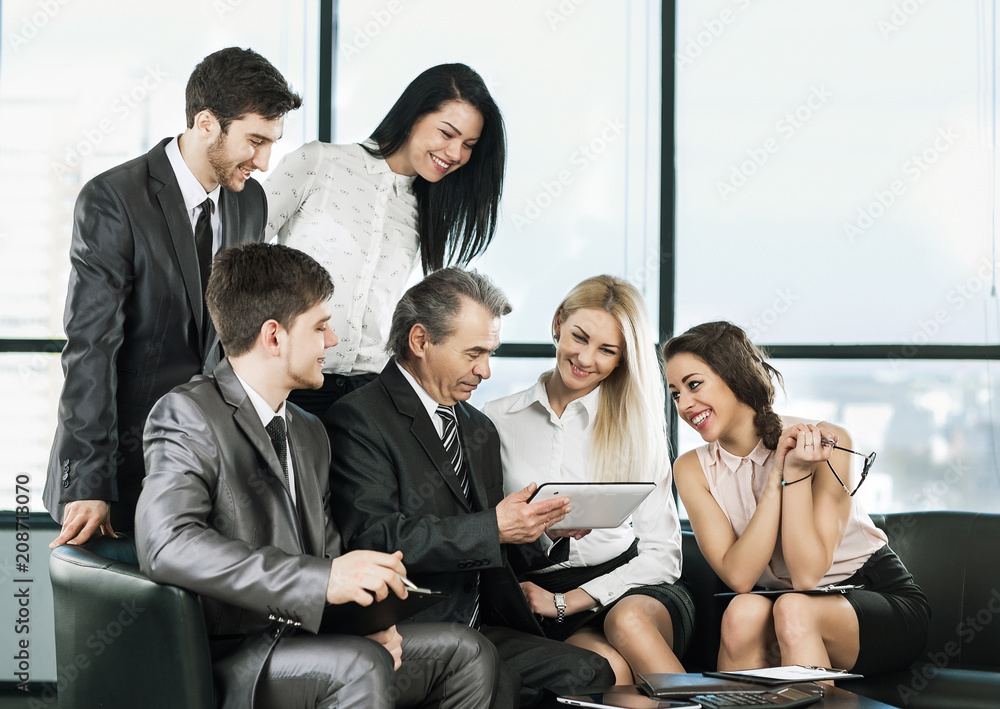 A group of businessmen discussing the policy of the company A group of businessmen discussing the policy of the company
