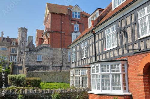 Medieval houses with brickstone and flagstone roofs with Victorian building Purbeck House Hotel in the background, Swanage, Isle of Purbeck, Dorset, UK