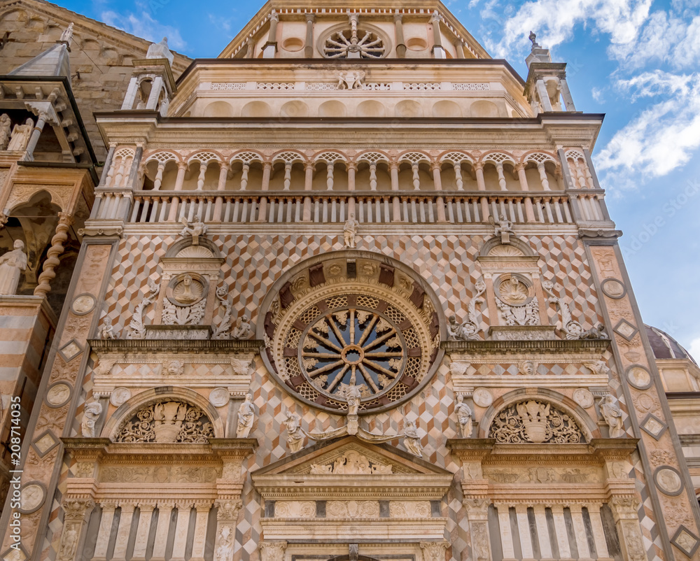 Facade of the Basilica of Santa Maria Maggiore and Cappella Colleoni in Citta Alta of Bergamo, Italy on a sunny day