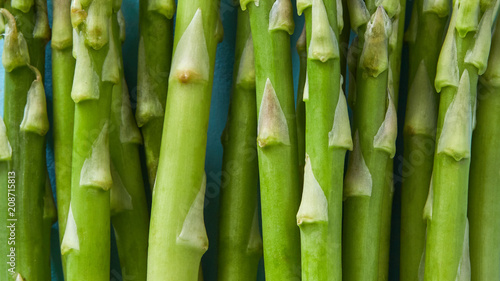 Fototapeta Naklejka Na Ścianę i Meble -  fresh green asparagus macro raw - food closeup