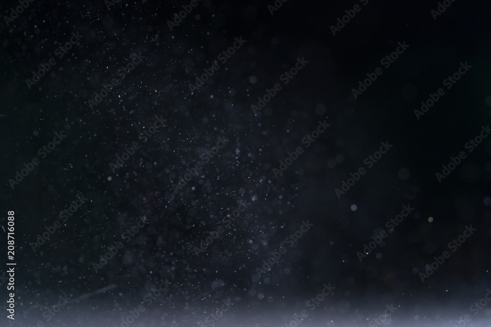 backlit real dust particles with lens flare backlit real dust particles with lens flare