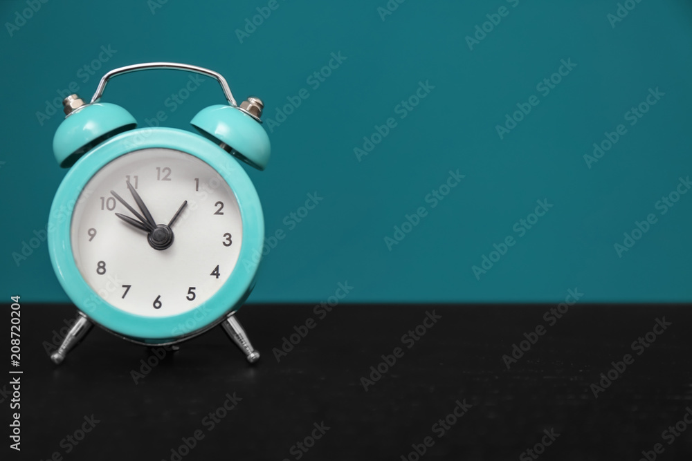 Alarm clock on color background. Time management concept