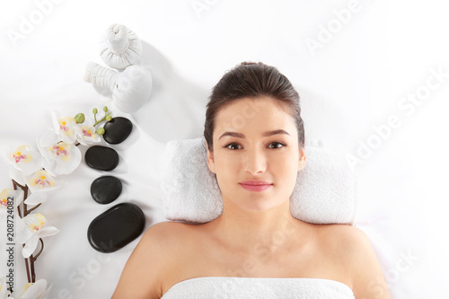 Young woman and spa accesso...
