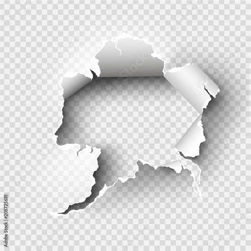Hole torn in ripped paper on transparent