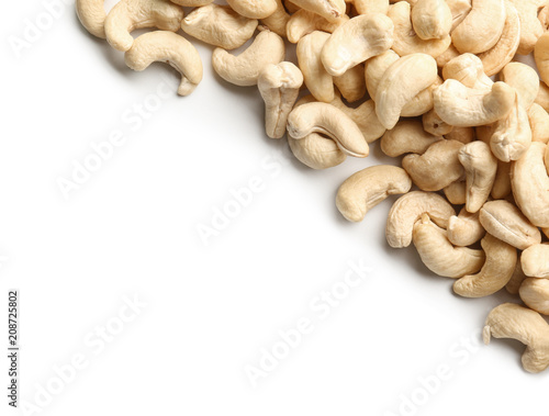 Tasty cashew nuts on white background