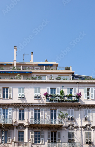 Pretty window facade with flowers in Nice, france