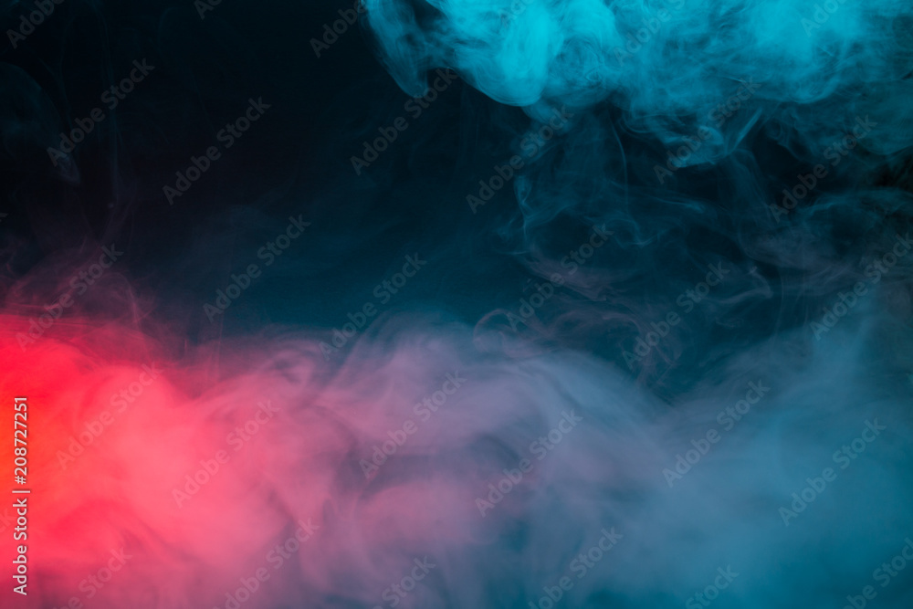 Colorful smoke on a black background closeup