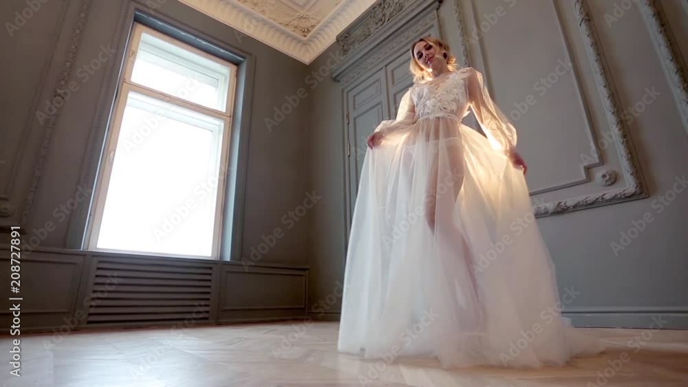 Beautiful sexy lady in elegant white robe Beautiful sexy lady in elegant white robe