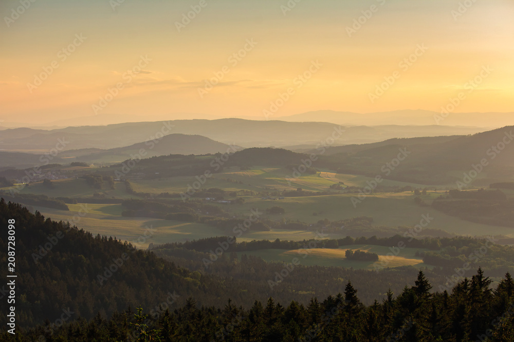 Nice sunset on forest and trees from kravi mountains, Czech landscape