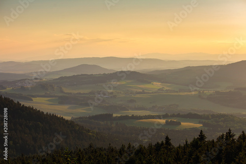 Nice sunset on forest and trees from kravi mountains  Czech landscape