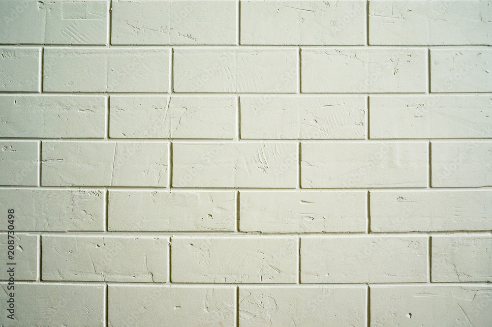 Fototapeta premium Brick wall white with scratches