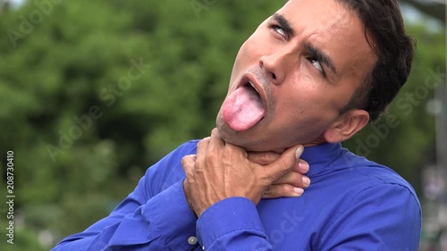 Young Hispanic Business Man Choking