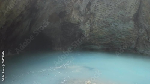 Natural underground karst mineral lake Proval with pure blue water in Pyatigorsk. photo