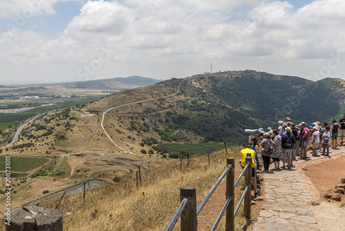 Golan Heights, June 2, 2018 : Tourist group observing the israel syrian border   photo