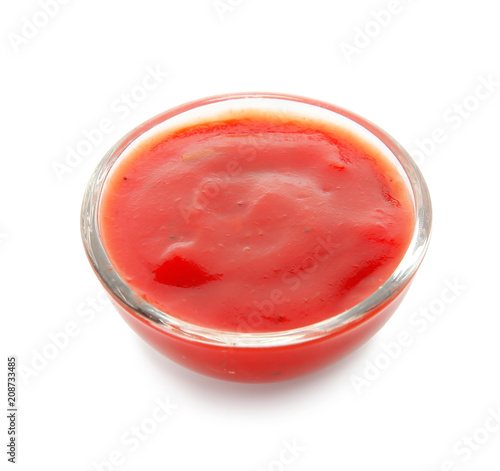 Tomato sauce in glass bowl on white background