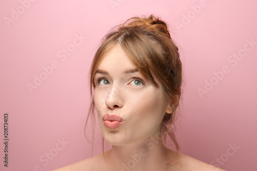 Wallpaper Mural Beautiful funny young woman with silky skin on color background Torontodigital.ca