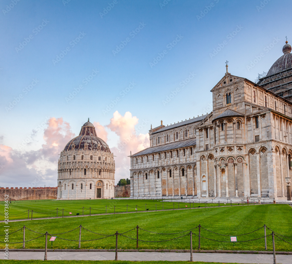 Piazza dei Miracoli known as Piazza del Duomo,  famous UNESCO World Heritage Site with the Baptistery and the Duomo Pisa Cathedral in Pisa, Tuscany, Italy