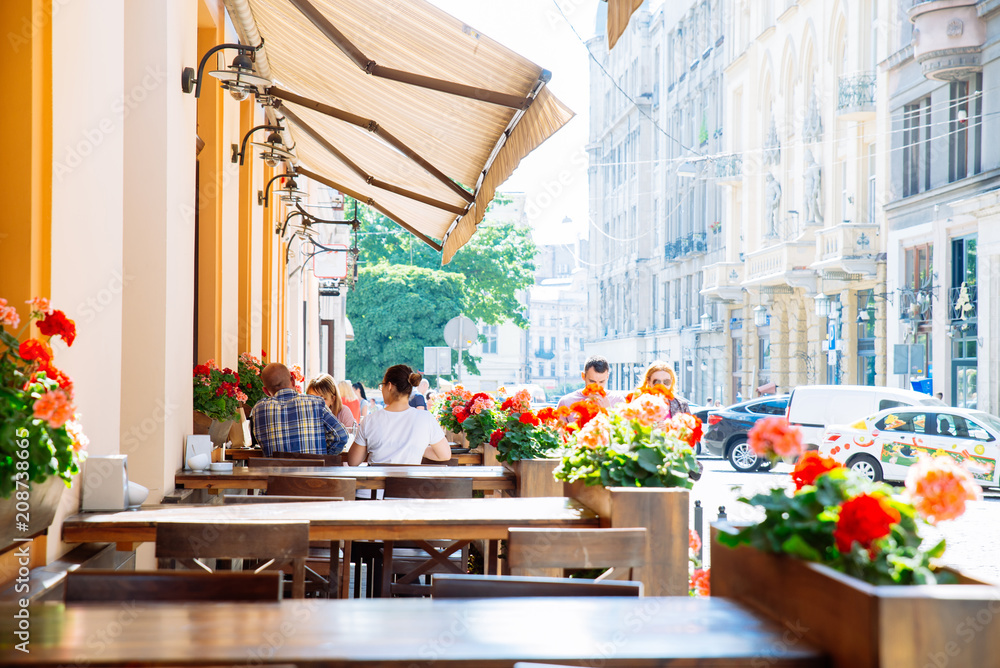 outside cafe in sunny day. old european city