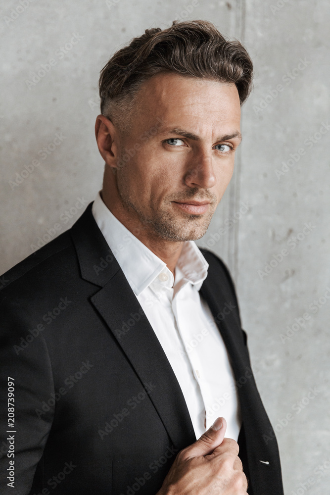 Close up portrait of a charming man dressed in suit Close up portrait of a charming man dressed in suit