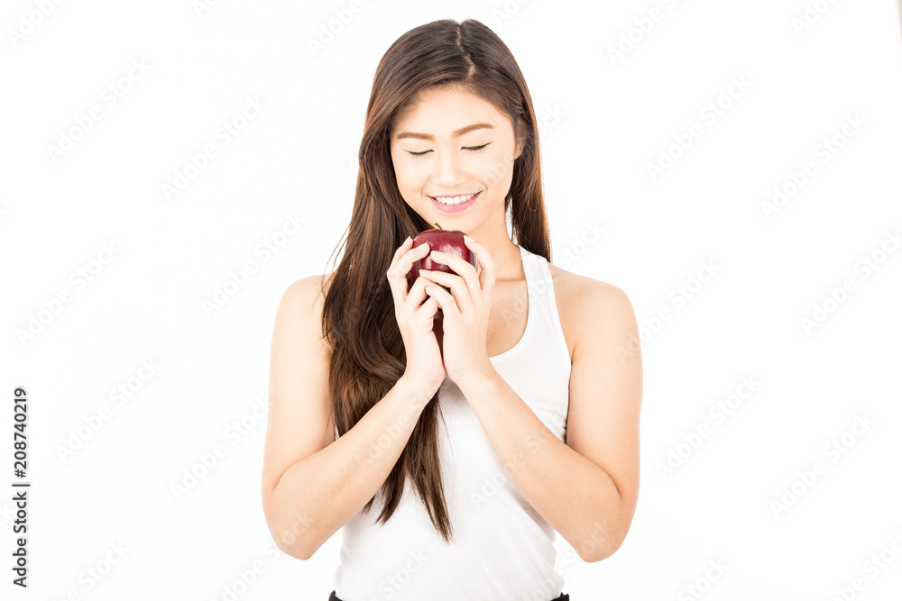 Beautiful Attractive Asian woman smile with white teeth and holding fresh red apple feeling so happiness and cheerful with Healthy skin,Isolated on white background,Beauty concept Beautiful Attractive Asian woman smile with white teeth and holding fresh red apple feeling so happiness and cheerful with Healthy skin,Isolated on white background,Beauty concept