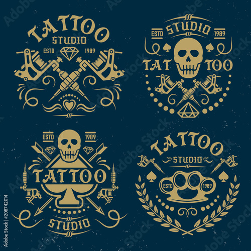 Tattoo studio vector emblems on dark blue backdrop