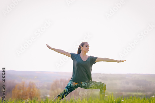 Young girl doing yoga outdoor