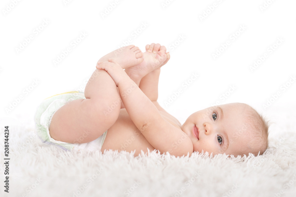 Cute baby girl on white blanket Cute baby girl on white blanket