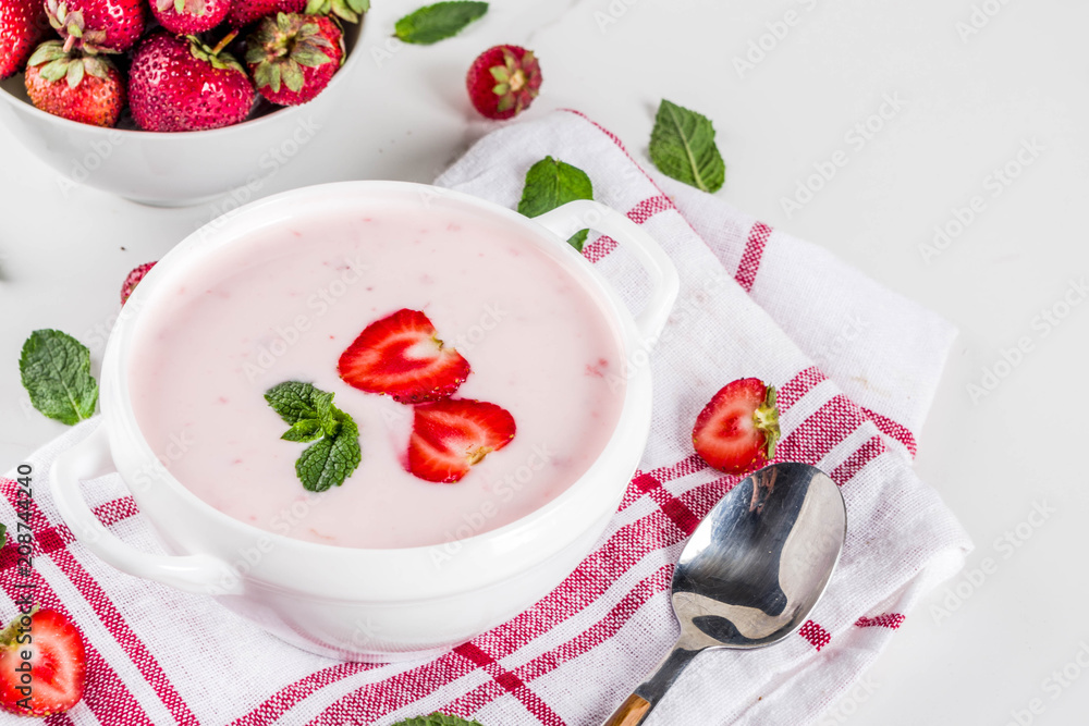 Sweet creamy strawberry soup, vegan summer food, white marble background copy space Sweet creamy strawberry soup, vegan summer food, white marble background copy space