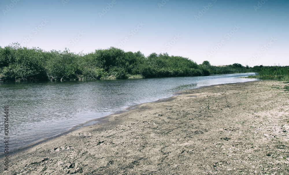 River with sandy shore. Summer landscape. Beautiful nature. River with sandy shore. Summer landscape. Beautiful nature.