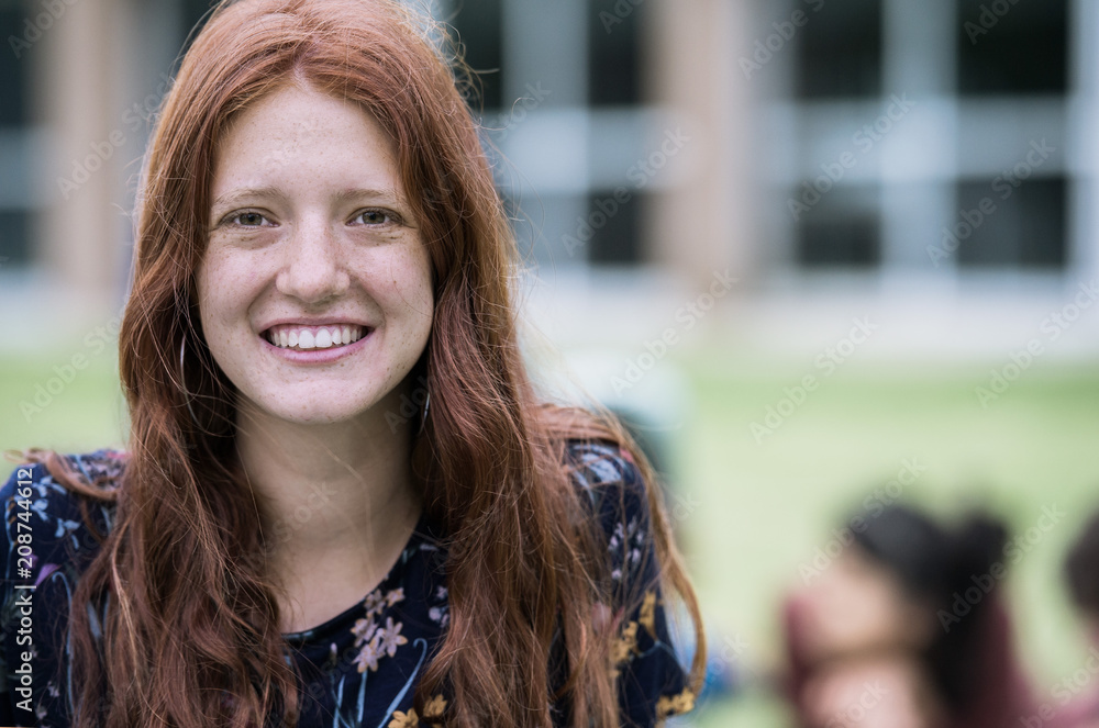 Young woman smiling cheerfully, portrait Young woman smiling cheerfully, portrait