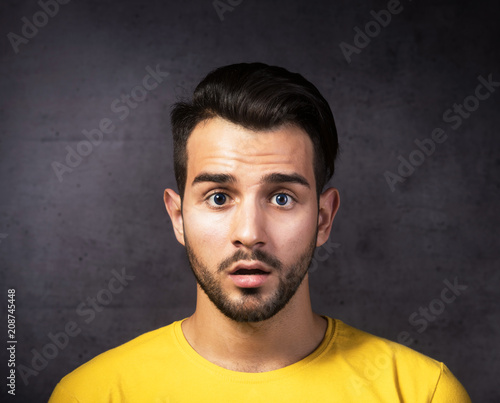 Close-up portrait of a shocked man