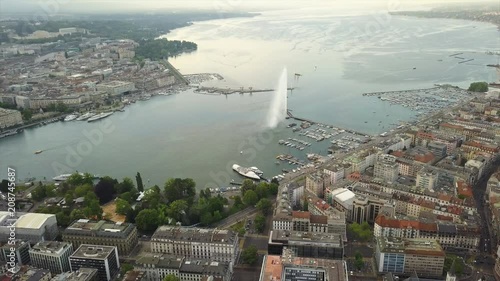 sunset time geneva cityscape lakeside fountain bay high aerial panorama 4k switzerland
