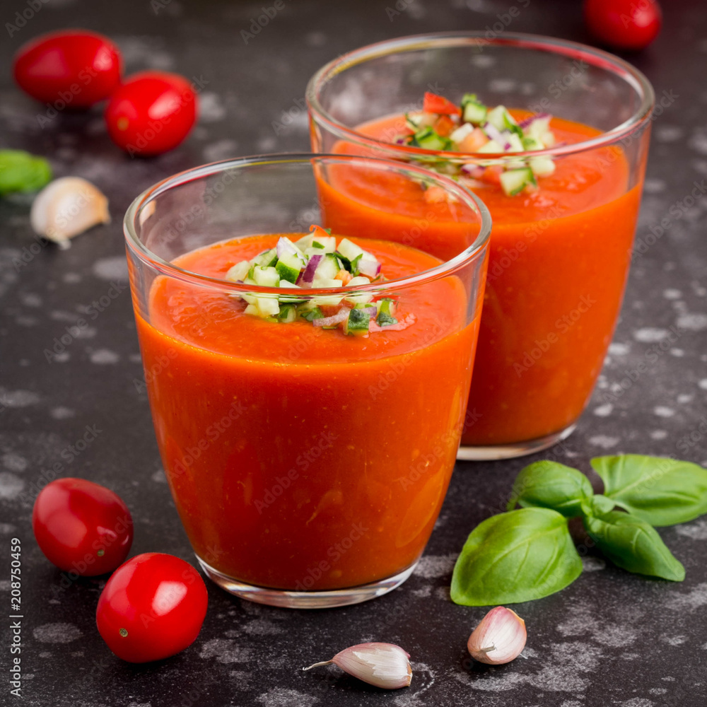 Italian red tomato cold gazpacho soup in glass, with cucumber, onion ...