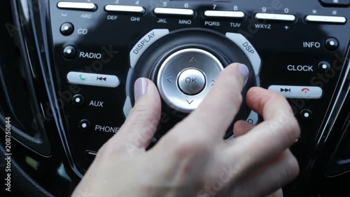 Wallpaper Mural Woman journeys by car, turns on radio to listen to music and volumes it up. Torontodigital.ca