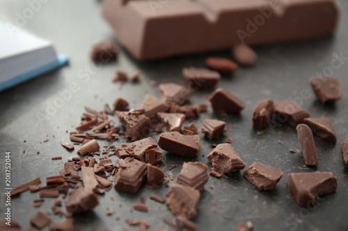 Delicious chocolate shavings on table, closeup