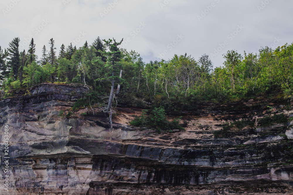 Pictured rocks national park on the Lake Superior, USA. Colorful textured rocks background