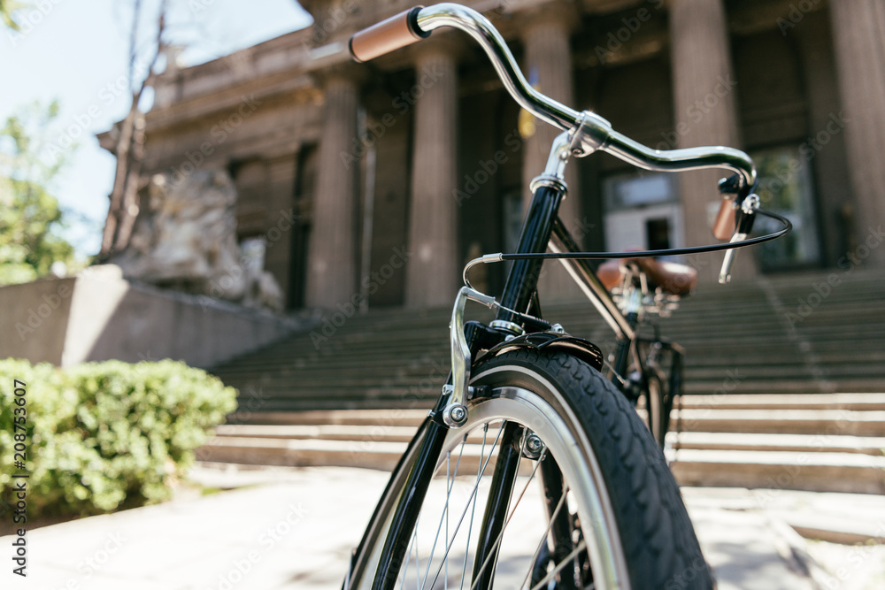 close-up view of bicycle on street at sunny day