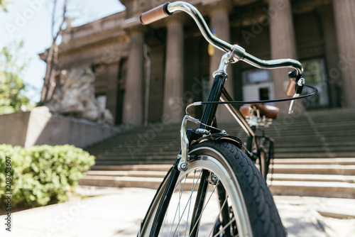 close-up view of bicycle on street at sunny day