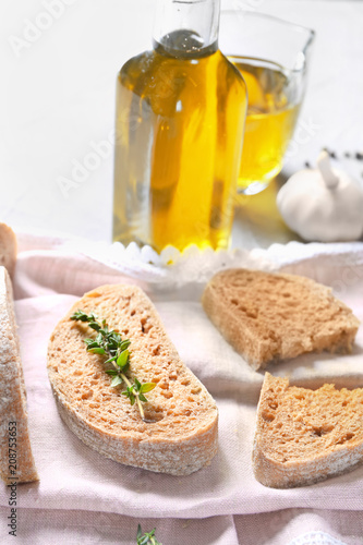Rustic Bread Slices with Ol...